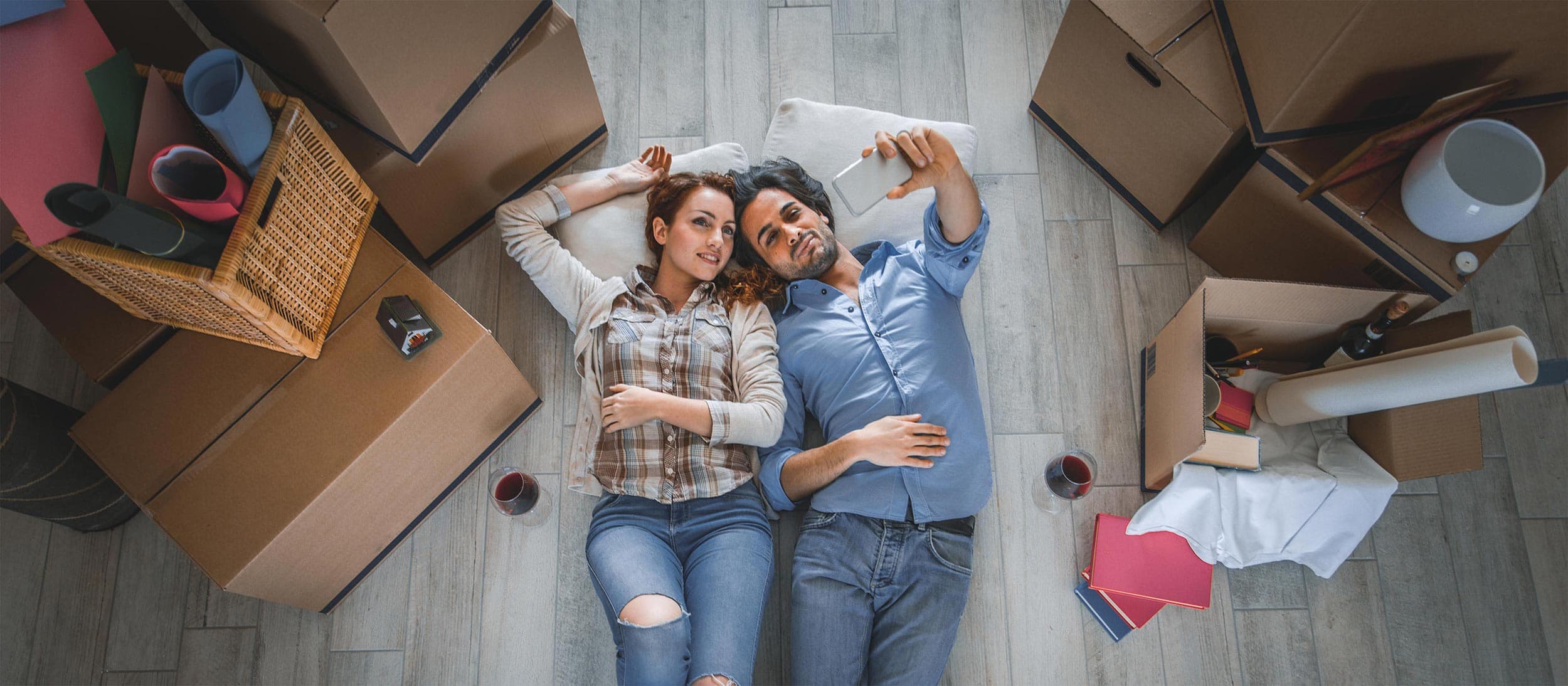 Couple celebrating their new home after a smooth move